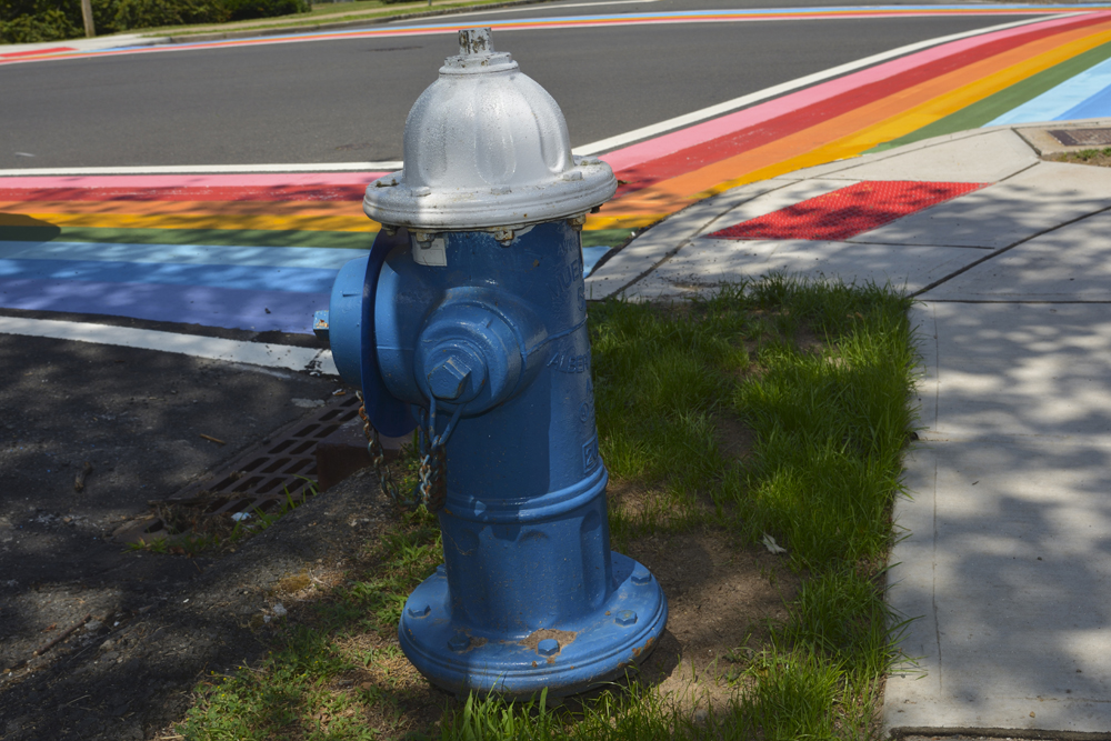 Maplewood, NJ June 2018 - Crosswalk painted in pink, red, orange, yellow, green, light blue and blue to symbolize that LGBTQ pride should be celebrated every day