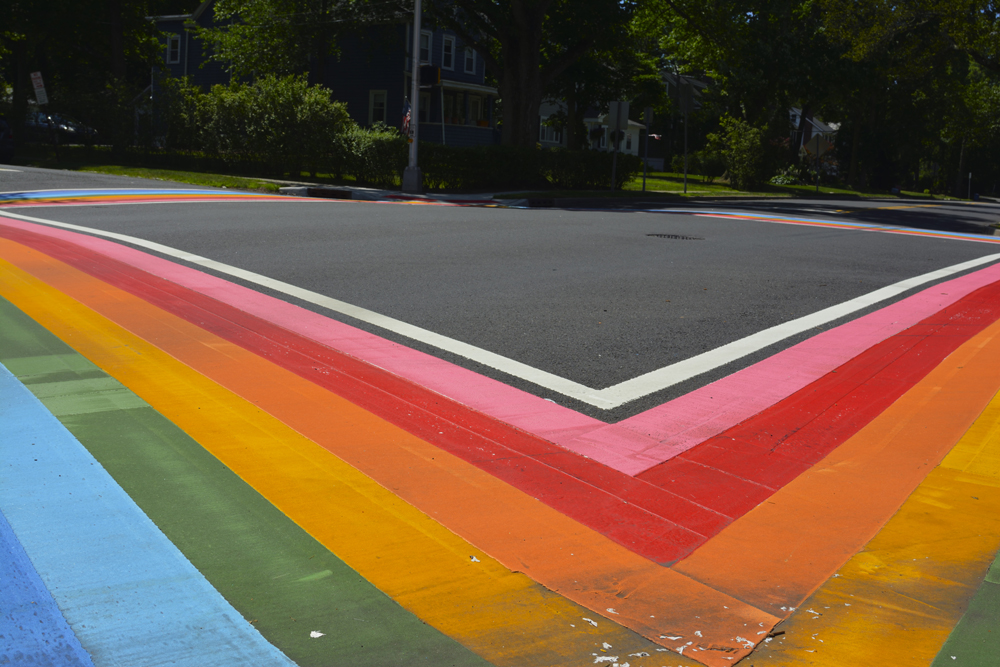 Maplewood, NJ June 2018 - Crosswalk painted in pink, red, orange, yellow, green, light blue and blue to symbolize that LGBTQ pride should be celebrated every day
